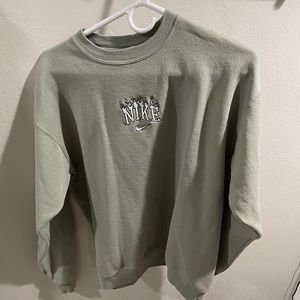 Nike Embroidered “Flame” Logo Crewneck